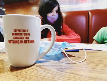 Coffee cup on table