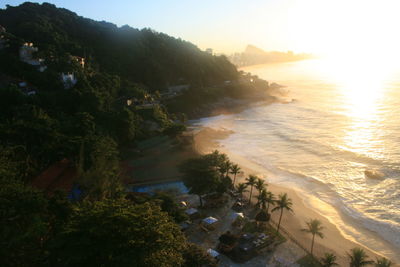 High angle view of beach against sky during sunset