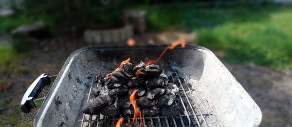 Close-up of fire on barbecue