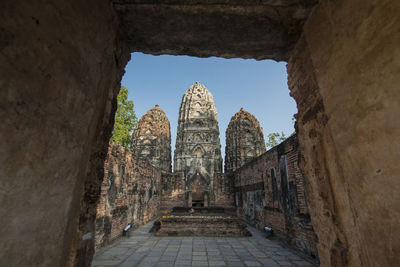 Panoramic view of old temple amidst buildings