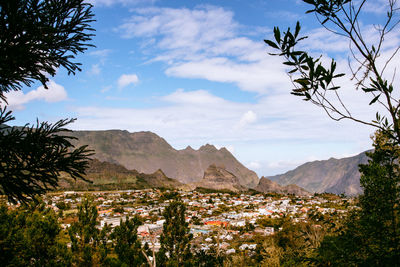 Scenic view of landscape and mountains against sky