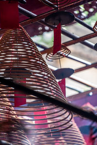 Low angle view of decorations hanging on roof of building