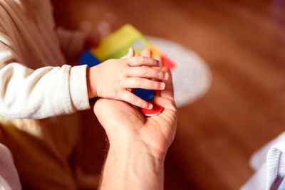 Close-up of woman holding hands