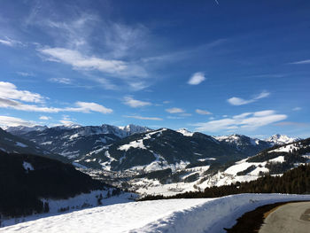 Scenic view of snowcapped mountains against sky