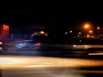 Light trails on city street at night