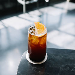 Close-up of drink on marble