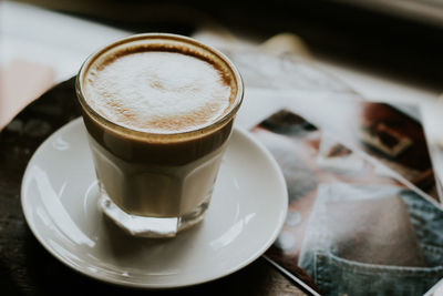 Close-up of coffee cup in saucer