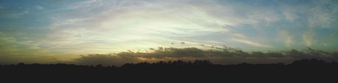 Scenic view of landscape against sky during sunset