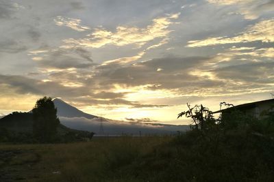 Scenic view of landscape against sky during sunset