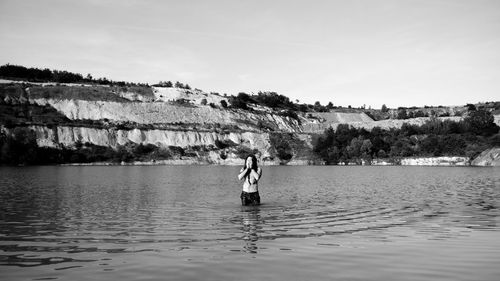 Woman standing in water