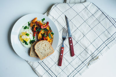 High angle view of breakfast served on table