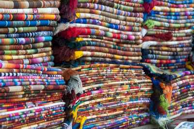 Stack of blankets for sale at shop