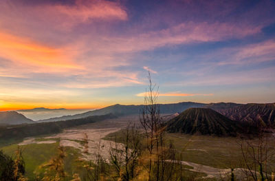 View of landscape against cloudy sky