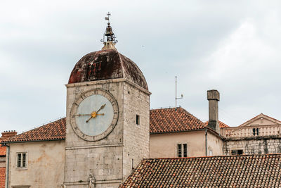 Town hall clock tower in old town of trogir in croatia