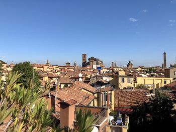 High angle view of townscape against blue sky