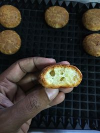 Close-up of hand holding bread