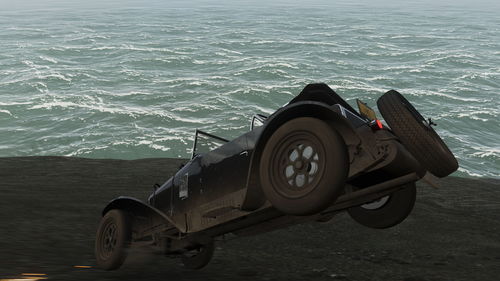 High angle view of motorcycle by sea against sky