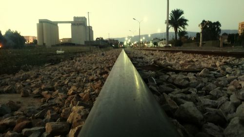 Railroad tracks against clear sky