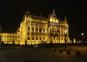 Facade of historic building at night