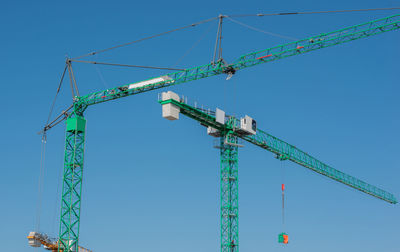 Mobile construction and tower crane at a construction site for building construction