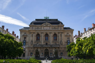 Facade of historic building against sky