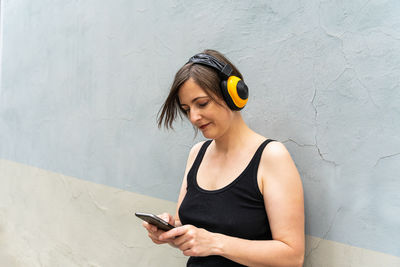 Young woman using mobile phone