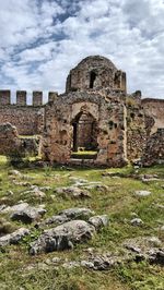 Old ruins against cloudy sky