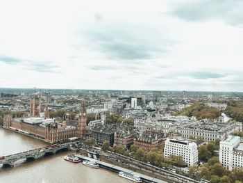 High angle view of river amidst buildings in city