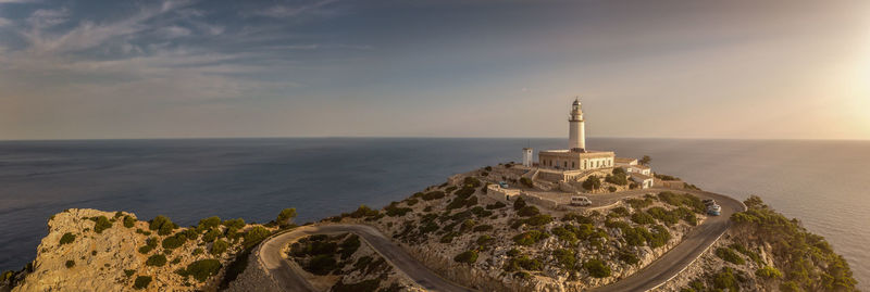 Scenic view of sea and buildings against sky