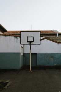 Basketball hoop against clear sky