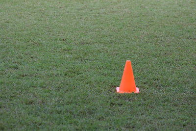 Sport training cone on grassy field