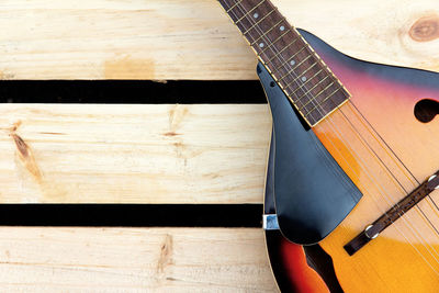 Close-up of mandolin on wooden table