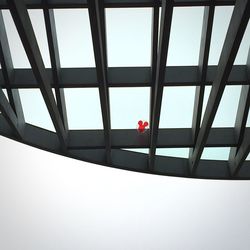 Low angle view of window against sky