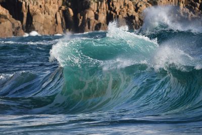 Stormy seas on the beach as the waves break