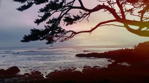 Scenic view of sea against sky at sunset