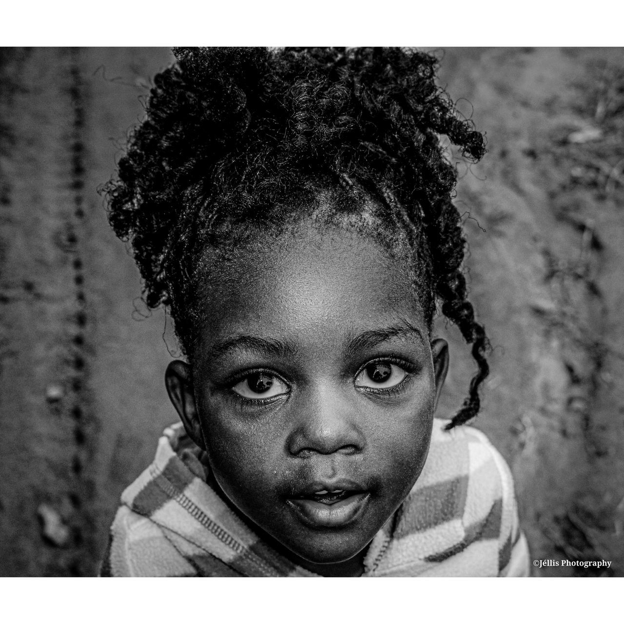 portrait, child, childhood, one person, transfer print, black and white, headshot, hairstyle, auto post production filter, looking at camera, monochrome photography, human hair, curly hair, human face, front view, emotion, smiling, person, men, poverty, dreadlocks, portrait photography, female, lifestyles, monochrome, close-up, cute, women, human head, toddler, casual clothing, innocence