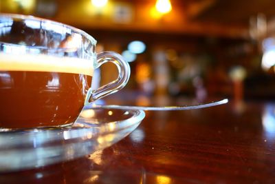 Close-up of coffee cup on table