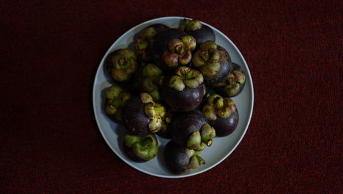 High angle view of fruits in bowl on table