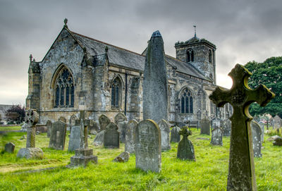 View of cemetery against building