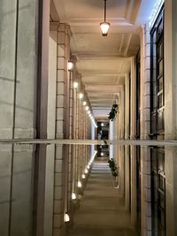 Illuminated corridor of building