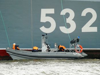 People on boat in water