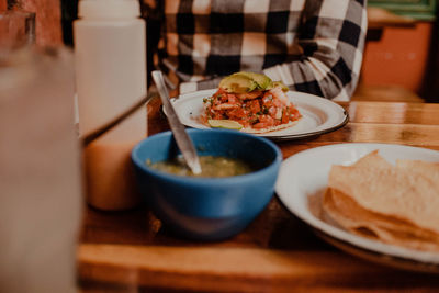 Close-up of food served on table