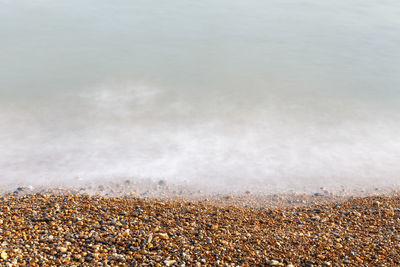 Close-up of water on beach