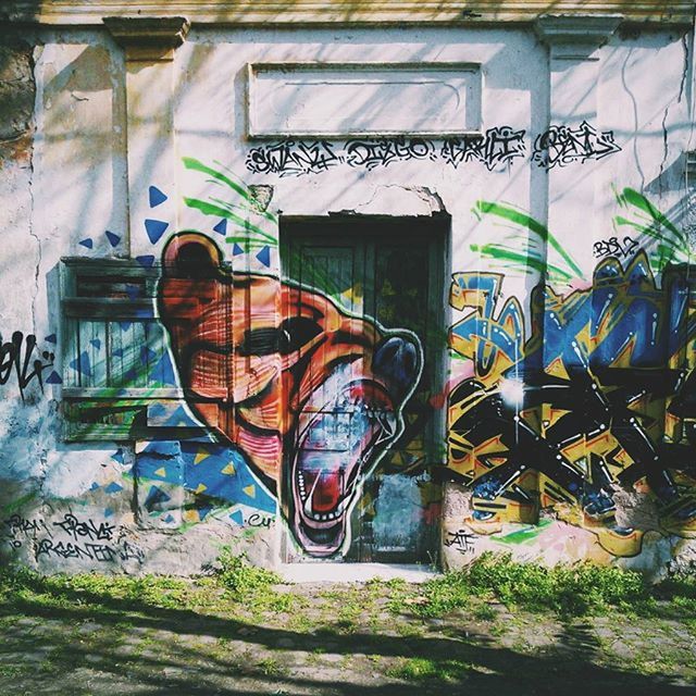 graffiti, architecture, built structure, building exterior, abandoned, wall - building feature, art, damaged, obsolete, old, house, window, door, art and craft, creativity, deterioration, weathered, plant, run-down, day