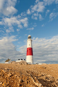 Portland bill lighthouse. dorset coast in isle of portland, uk.  a way-mark guiding vessels.