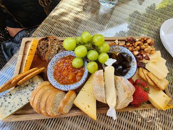 High angle view of charcuterie cheese board.