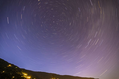 Low angle view of star field against sky at night