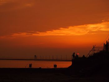 Scenic view of sea against sky at sunset