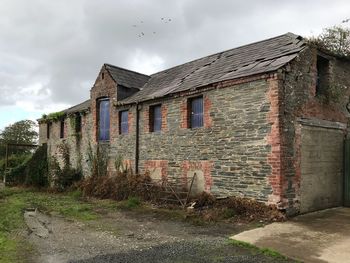 Exterior of old building against sky