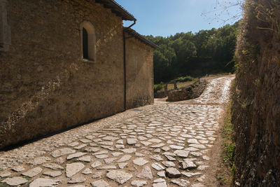 The romanesque church of santa maria is located in a lonely place on the slopes of mount velino.